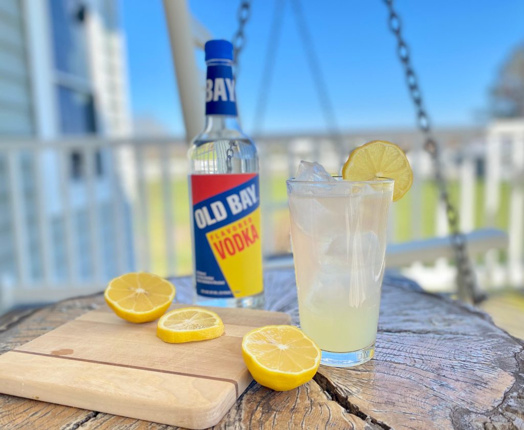 old bay vodka bottle on table with cocktail