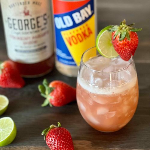 Old Bay Vodka and George's Strawberry Cocktail Mix with Cocktail strawberries and lime