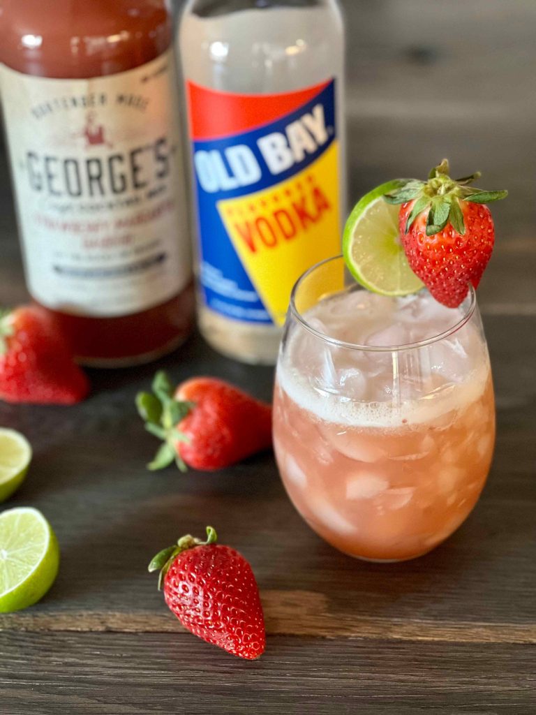 Old Bay Vodka and George's Strawberry Cocktail Mix with Cocktail strawberries and lime