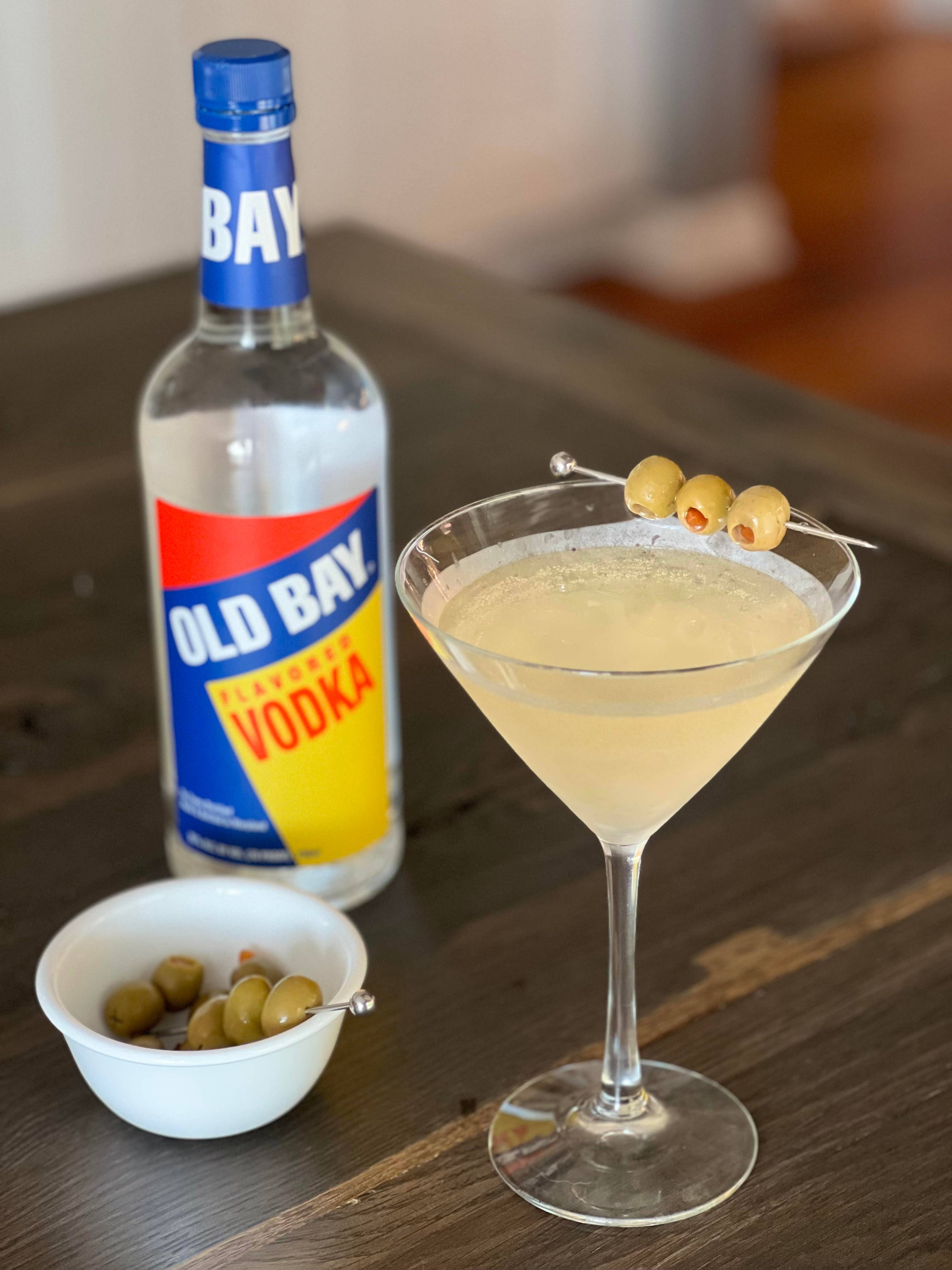 dirty martini with old bay vodka bottle